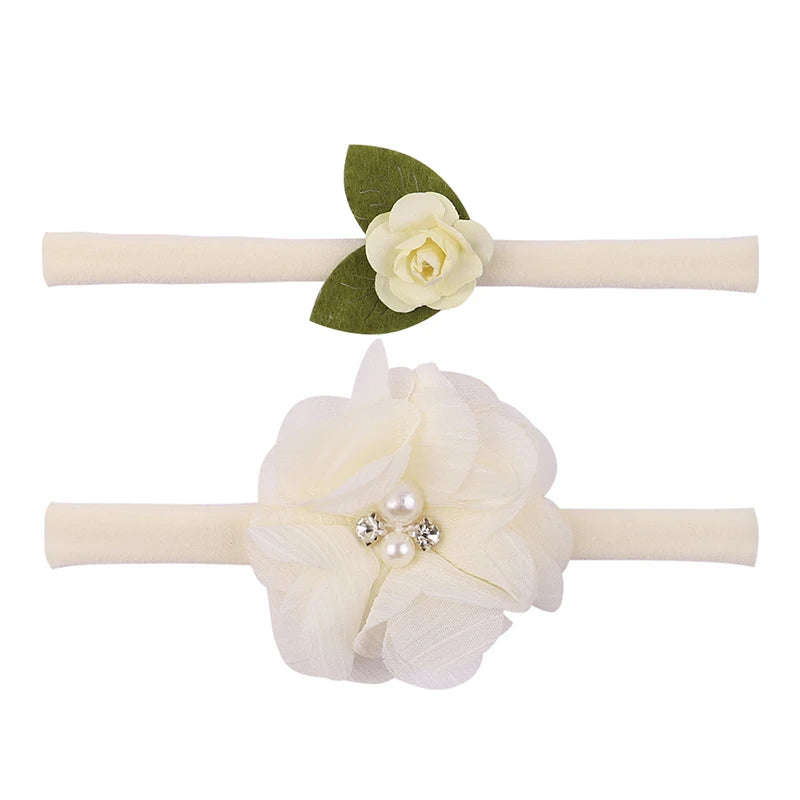 🎀 Encante sua Princesinha com Estilo! 🎀

Deixe sua bebê ainda mais fofa com nossa tiara elástica com flor delicada! Feita com materiais macios e confortáveis, é perfeita para recém-nascidos e bebês. Ideal para qua